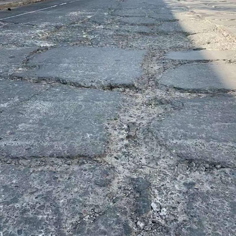 金川路面起砂露石子修补料